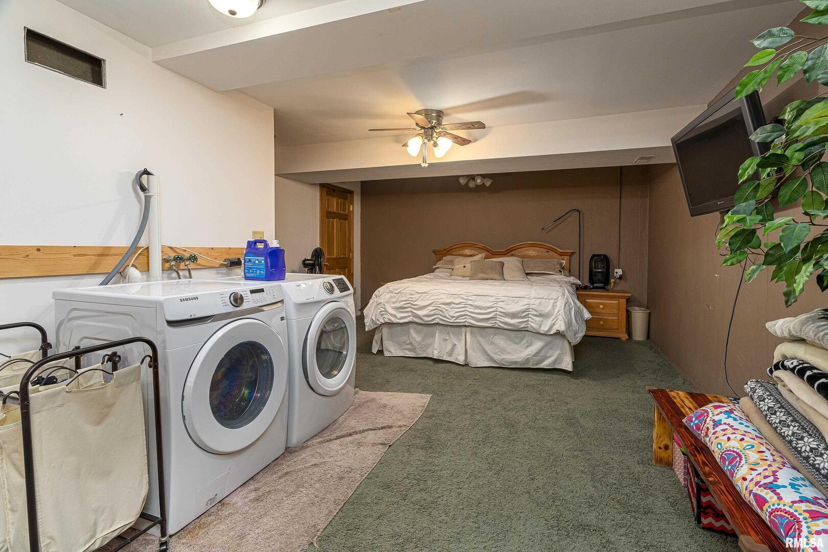 220 Timber Ridge Lane Jonesboro, IL 62952 - Photo 17 of 24 a bedroom with bed and windows