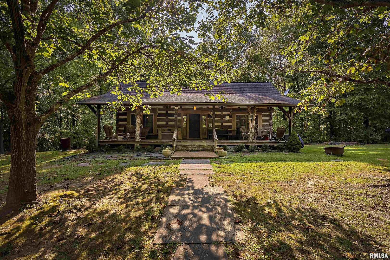 220 Timber Ridge Lane Jonesboro, IL 62952 - Photo 23 of 24 a view of a house with a yard