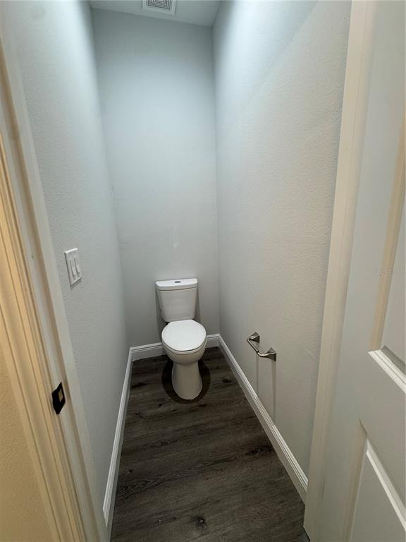 7105 Princeton Street Port Charlotte, FL 33981 - Photo 13 of 26 a bathroom with a toilet and a sink