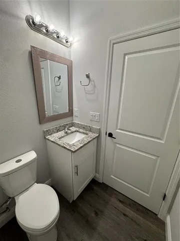 a bathroom with a bathtub and a toilet