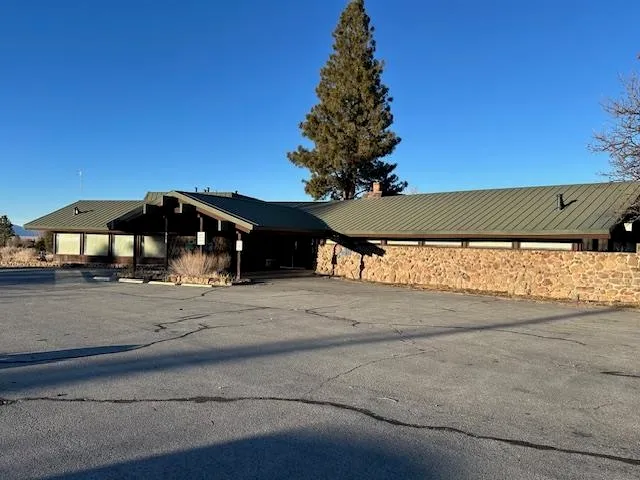 a view of street along with road and trees