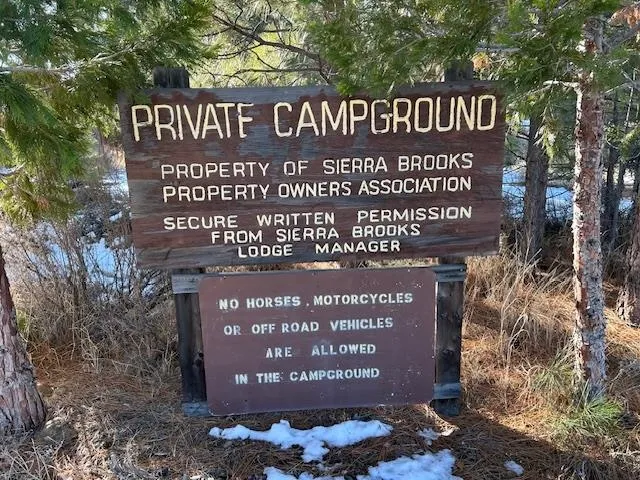 a sign on the side of the road