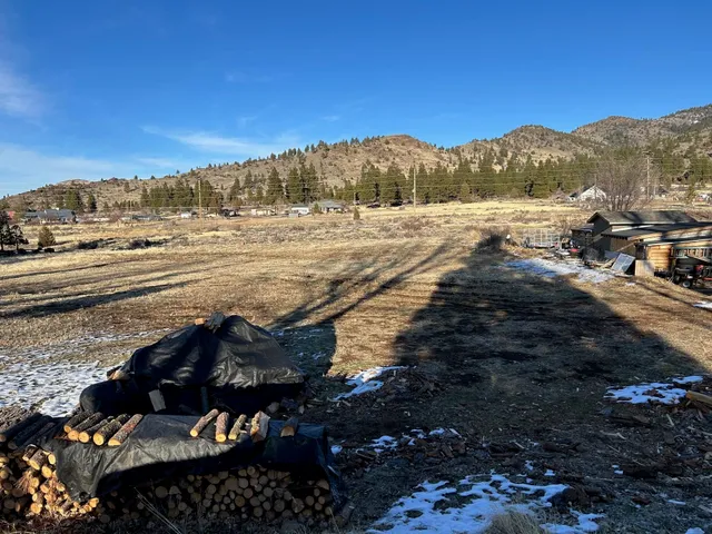 a view of a yard with an ocean view