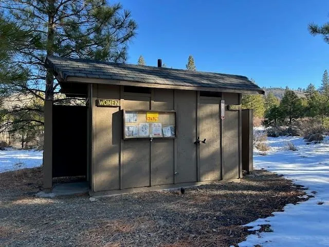 a sign on the side of the road