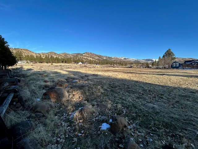 a view of an ocean and a mountain