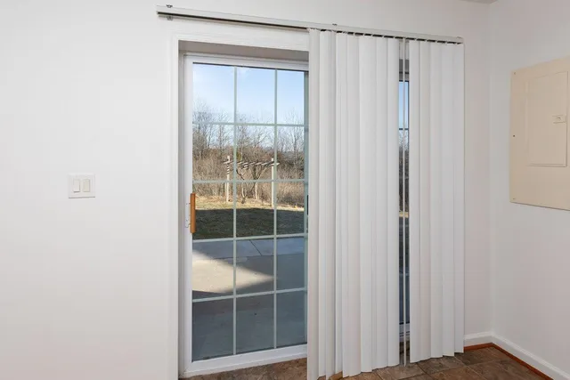 a kitchen with stainless steel appliances granite countertop a stove microwave and sink