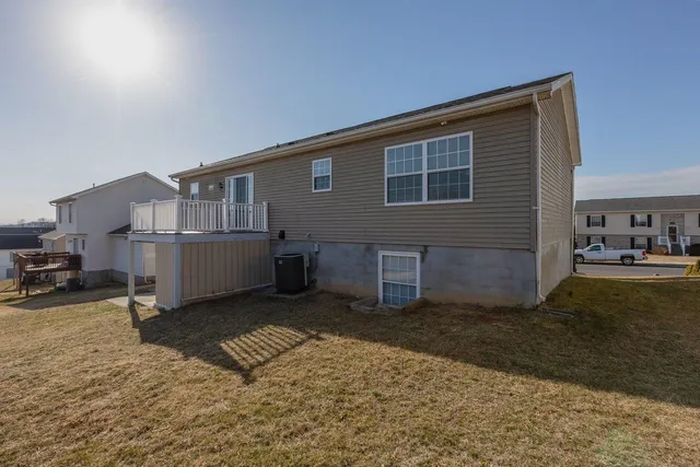 an aerial view of houses with outdoor space
