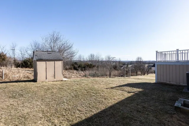 an aerial view of residential building and trees