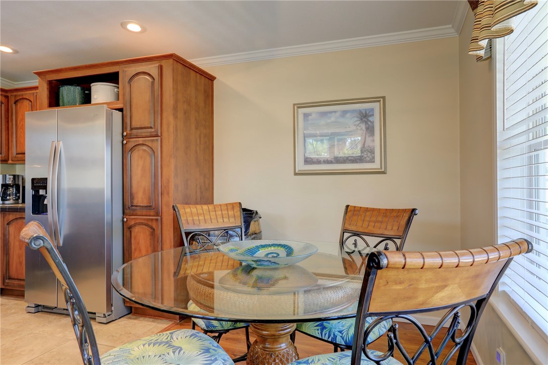 309 Pineapple Street Sebastian, FL 32958 - Photo 20 of 36 a dining room with furniture and wooden floor
