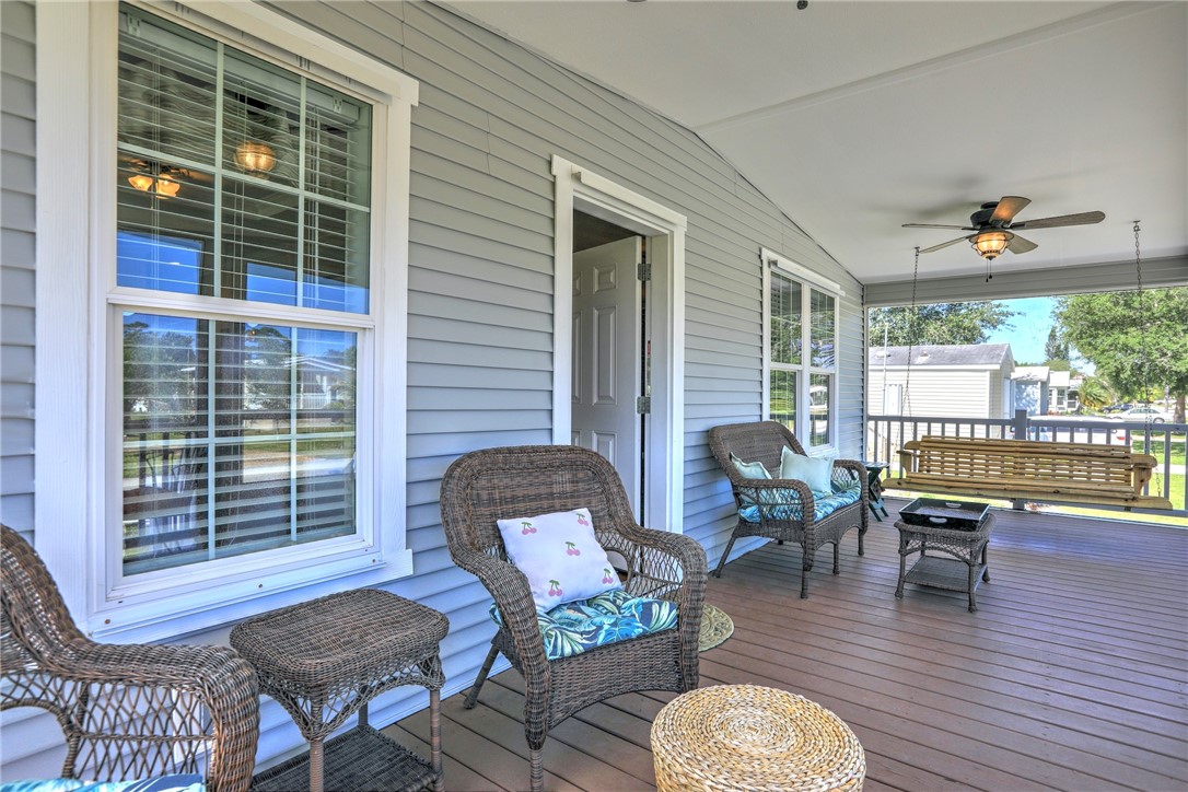 309 Pineapple Street Sebastian, FL 32958 - Photo 8 of 36 a living room with furniture and wooden floor