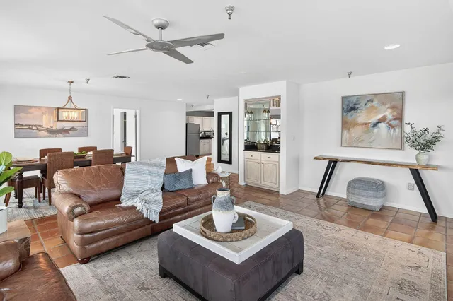 a kitchen with a table and chairs