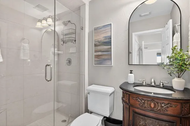 a swimming pool with outdoor seating and yard