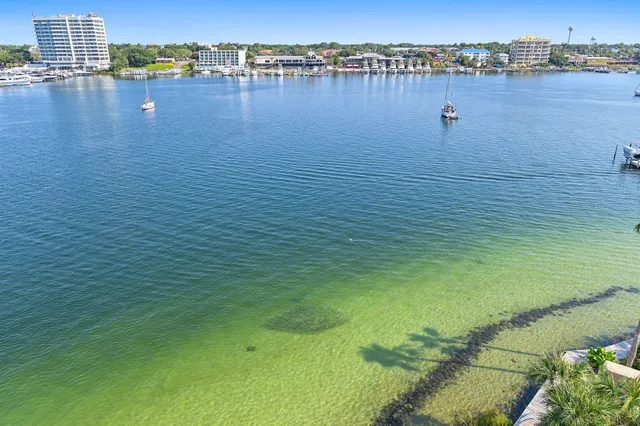 a view of a swimming pool and lounge chair