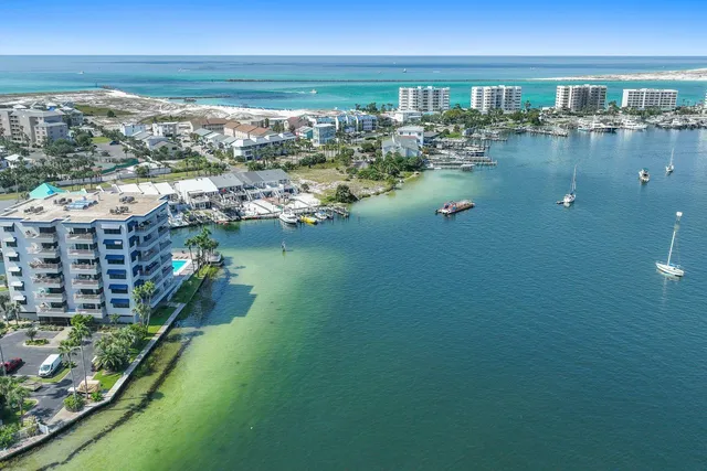 a building with cars parked in front of it