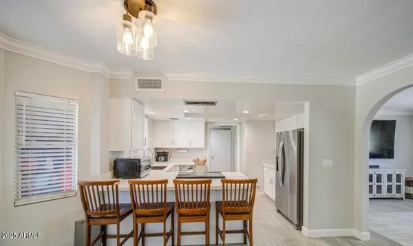 a view of a dining room with furniture