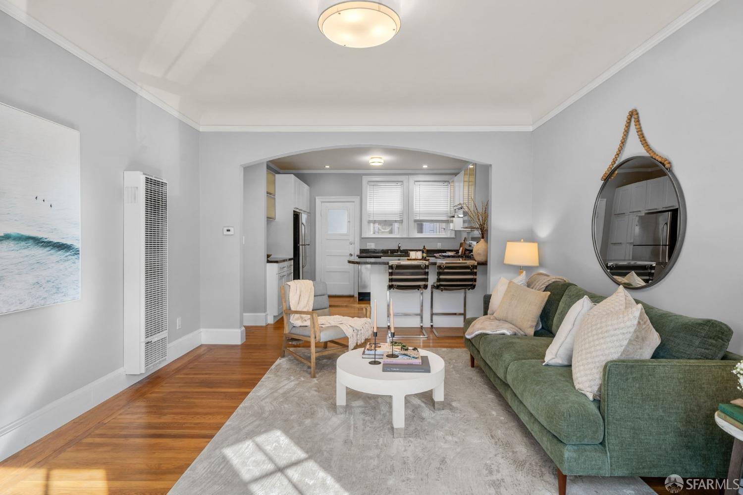 1310 5th Avenue, Unit 1 San Francisco, CA 94122 - Photo 11 of 31 a living room with furniture and a wooden floor