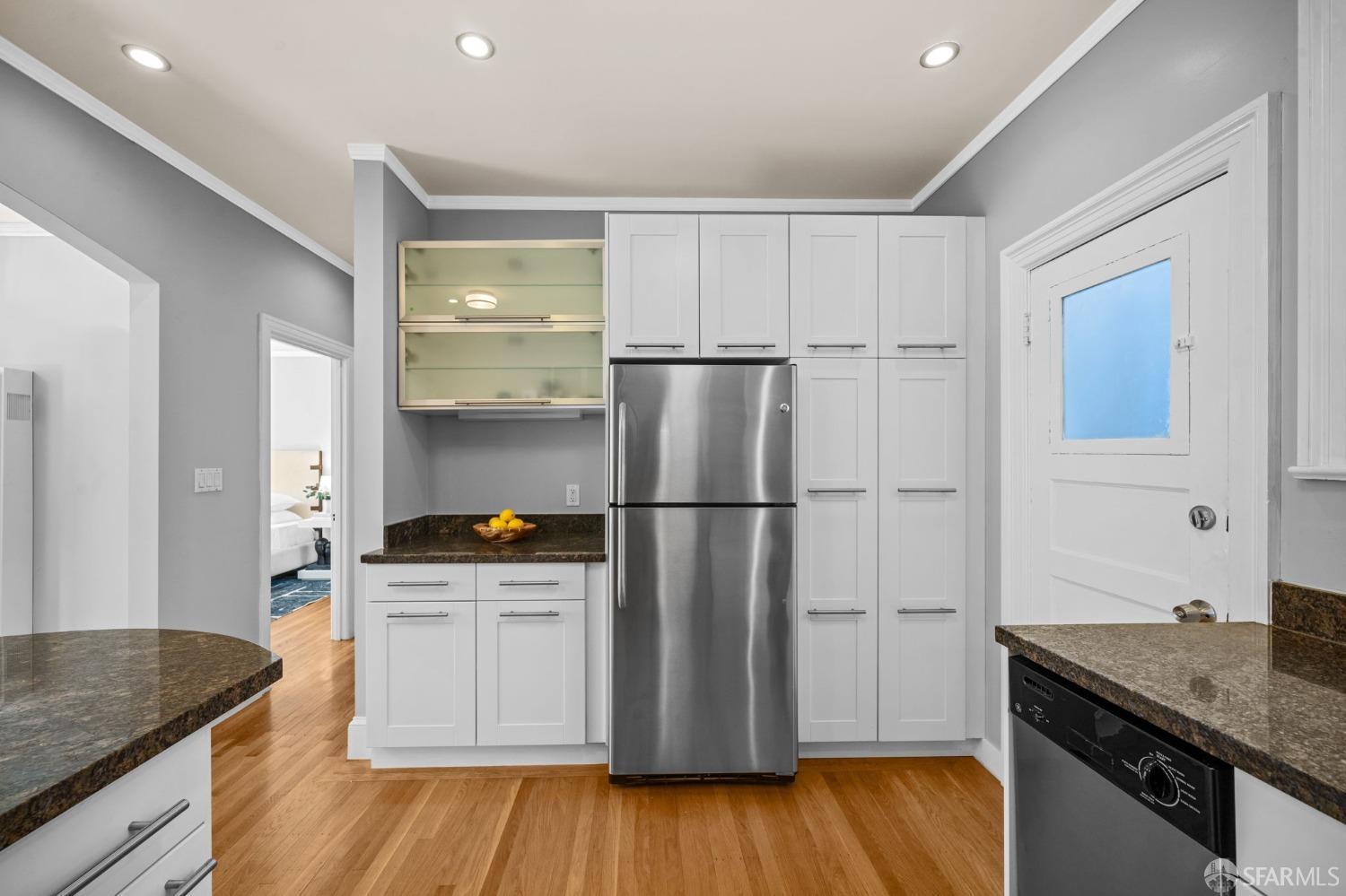 1310 5th Avenue, Unit 1 San Francisco, CA 94122 - Photo 8 of 31 a kitchen with a refrigerator and a sink
