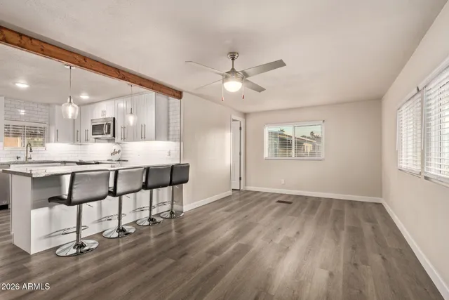 a view of kitchen with breakfast area