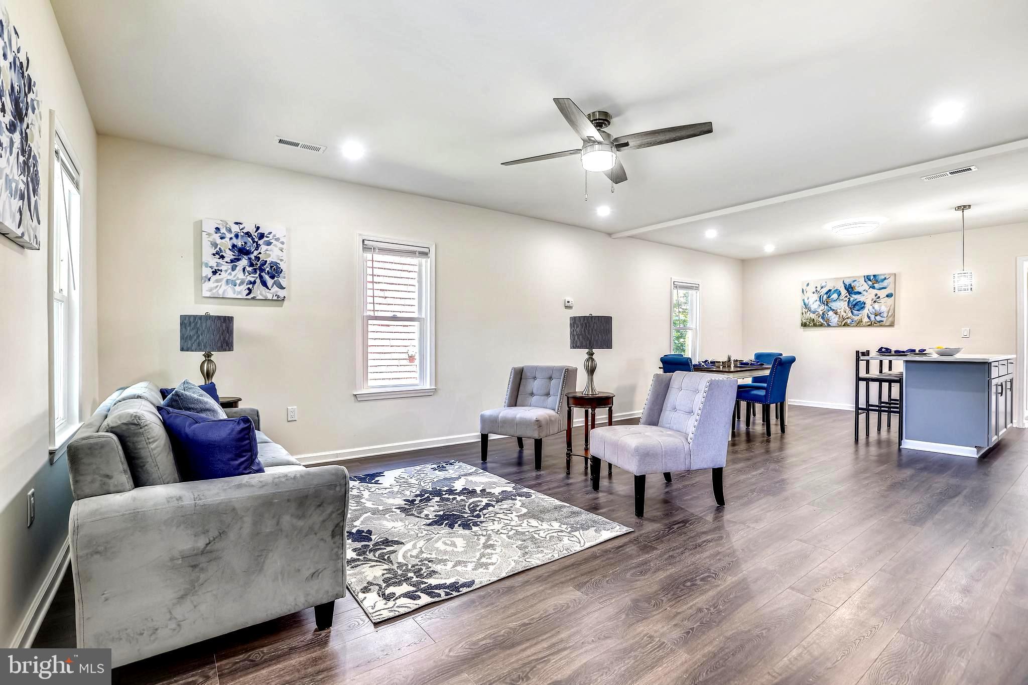 208 Maple Avenue Ridgely, MD 21660 - Photo 11 of 38 Living Room . Stylish Ceiling Fans Throughout