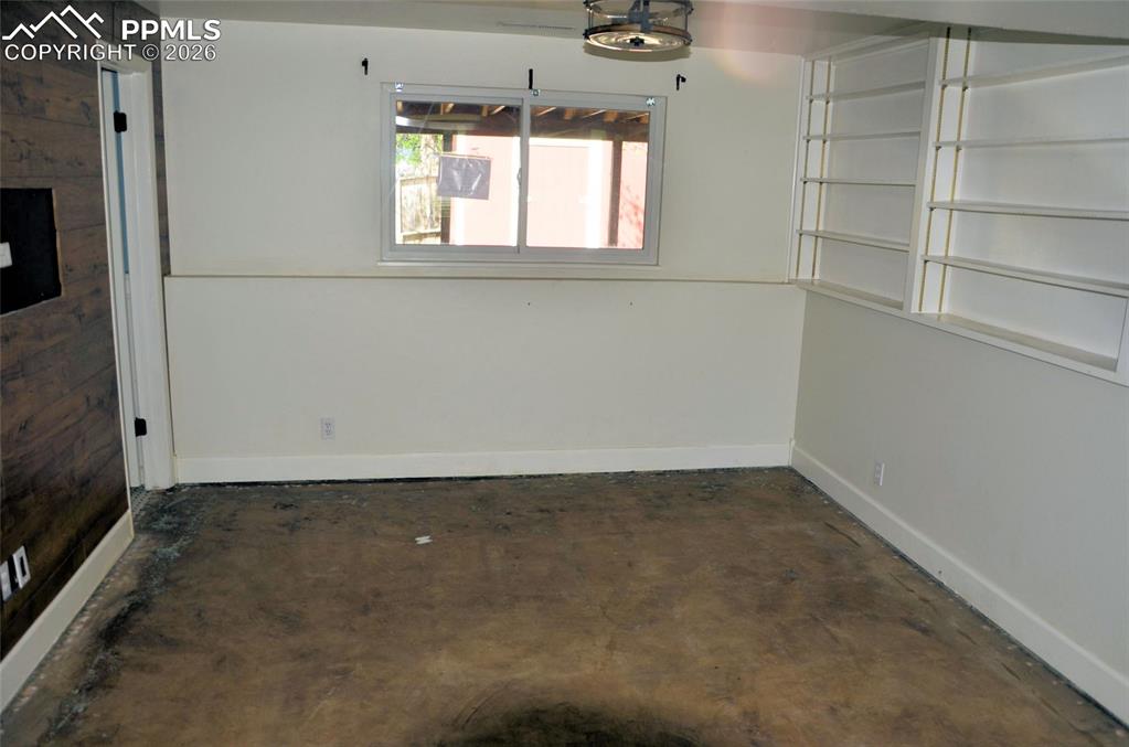 4506 Ranch Circle Colorado Springs, CO 80918 - Photo 11 of 15 a view of a room that has a window in it