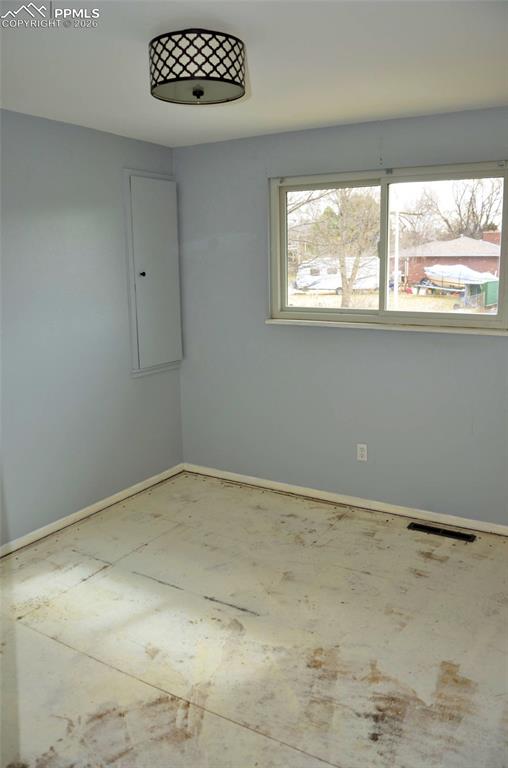 4506 Ranch Circle Colorado Springs, CO 80918 - Photo 14 of 15 a view of a window in an empty room