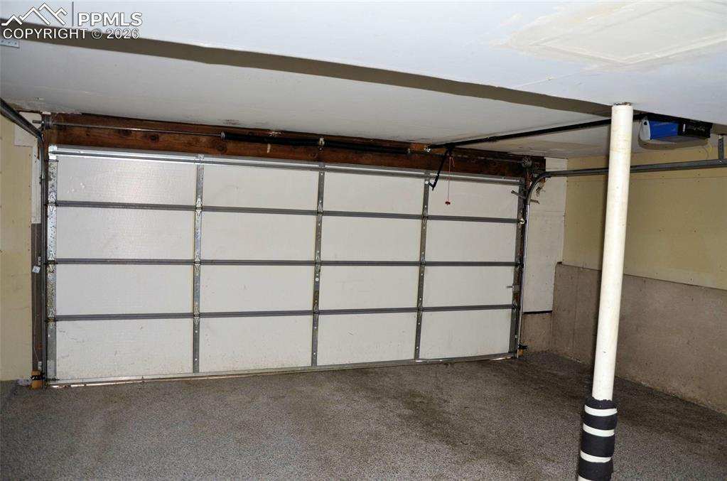 4506 Ranch Circle Colorado Springs, CO 80918 - Photo 15 of 15 a view of a room with a wooden walls
