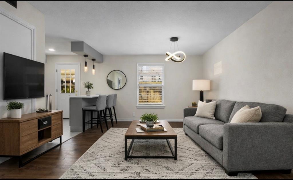 4941 North Hall Street Dallas, TX 75235 - Photo 5 of 18 Living room with dark wood finished floors and baseboards