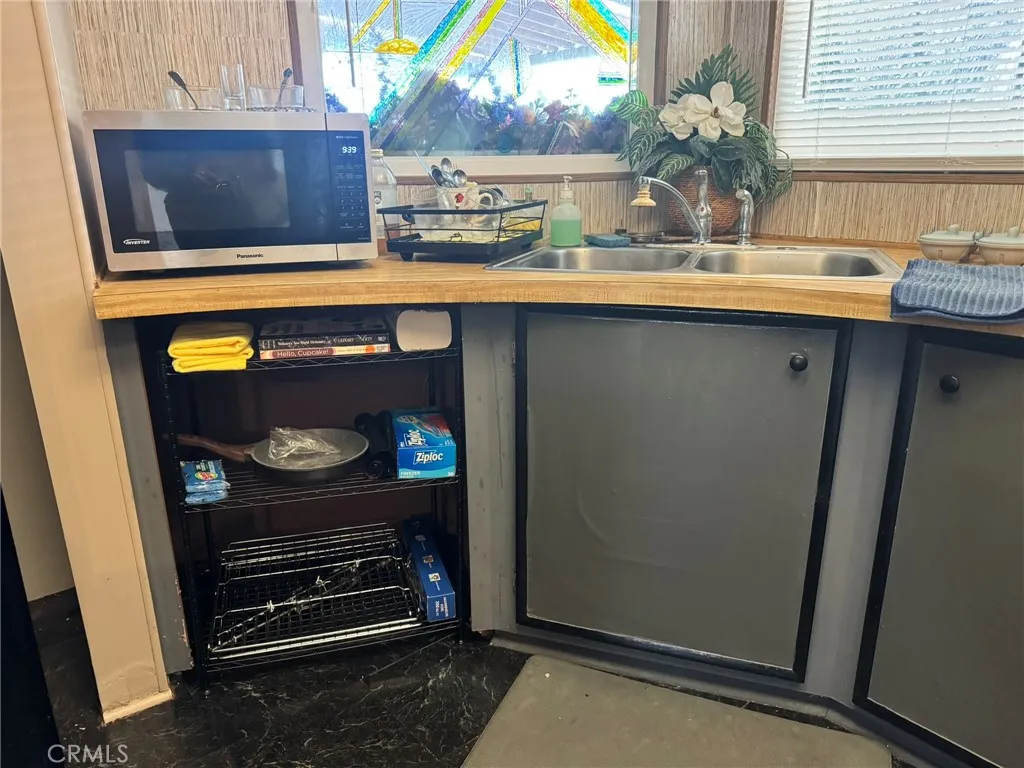 519 West Taylor Street, Unit 252 Santa Maria, CA 93458 - Photo 20 of 52 New Photo taken 1/5/26 - Dishwasher removed, but plumbing still in tact.