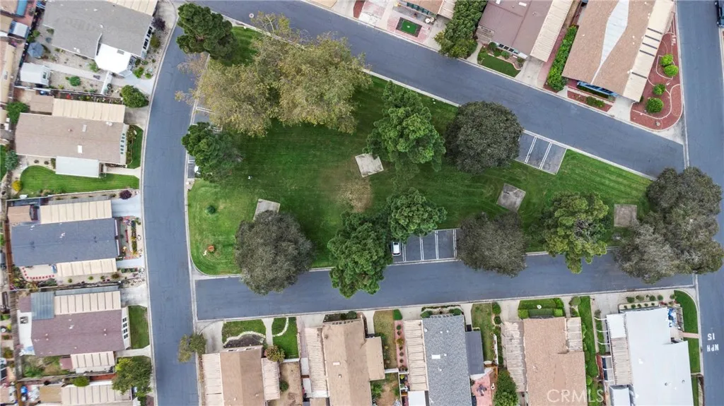 519 West Taylor Street, Unit 252 Santa Maria, CA 93458 - Photo 42 of 52 an aerial view of multiple houses with a yard