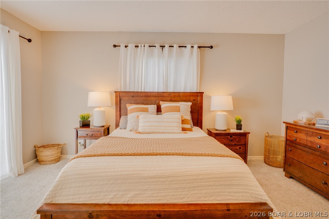 775 Winn Road, Unit 4L Osage Beach, MO 65065 - Photo 20 of 39 Master bedroom