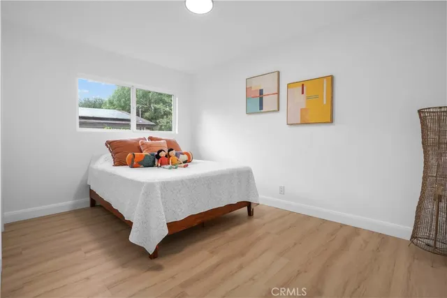 a room with a bed and a window