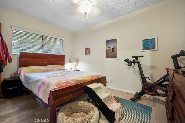a bathroom with a sink a toilet and shower curtain