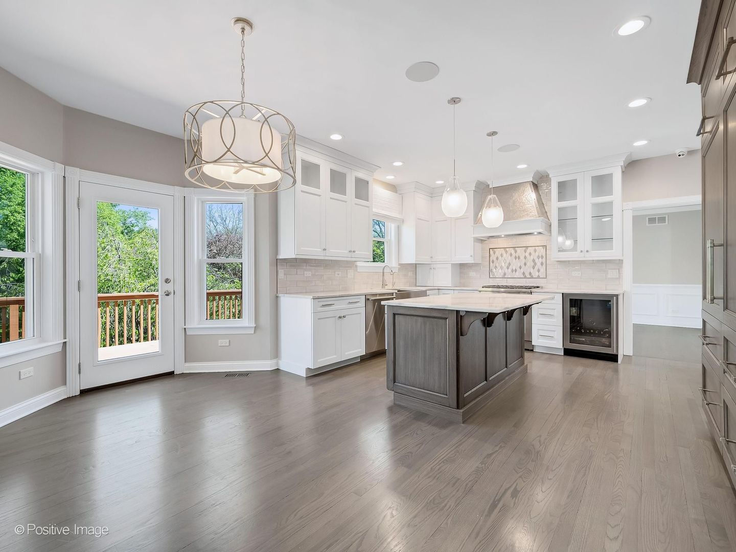 832 Bemis Road Glen Ellyn, IL 60137 - Photo 12 of 62 a large kitchen with cabinets a sink and a stove