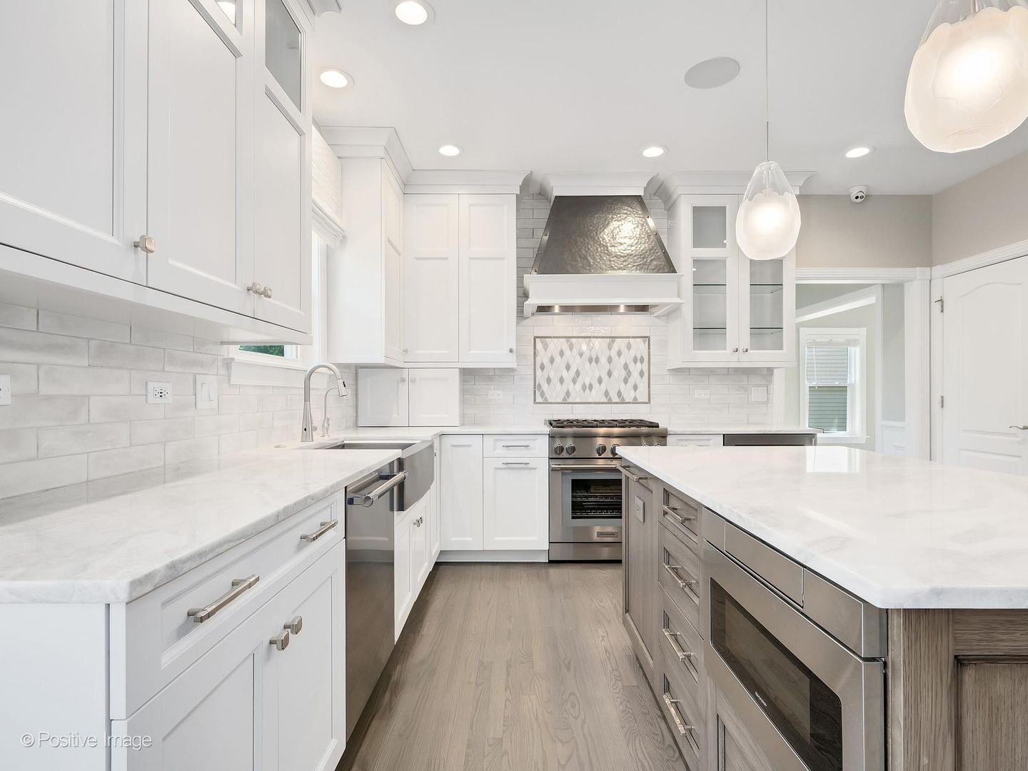 832 Bemis Road Glen Ellyn, IL 60137 - Photo 20 of 62 a kitchen with a stove a sink and a refrigerator