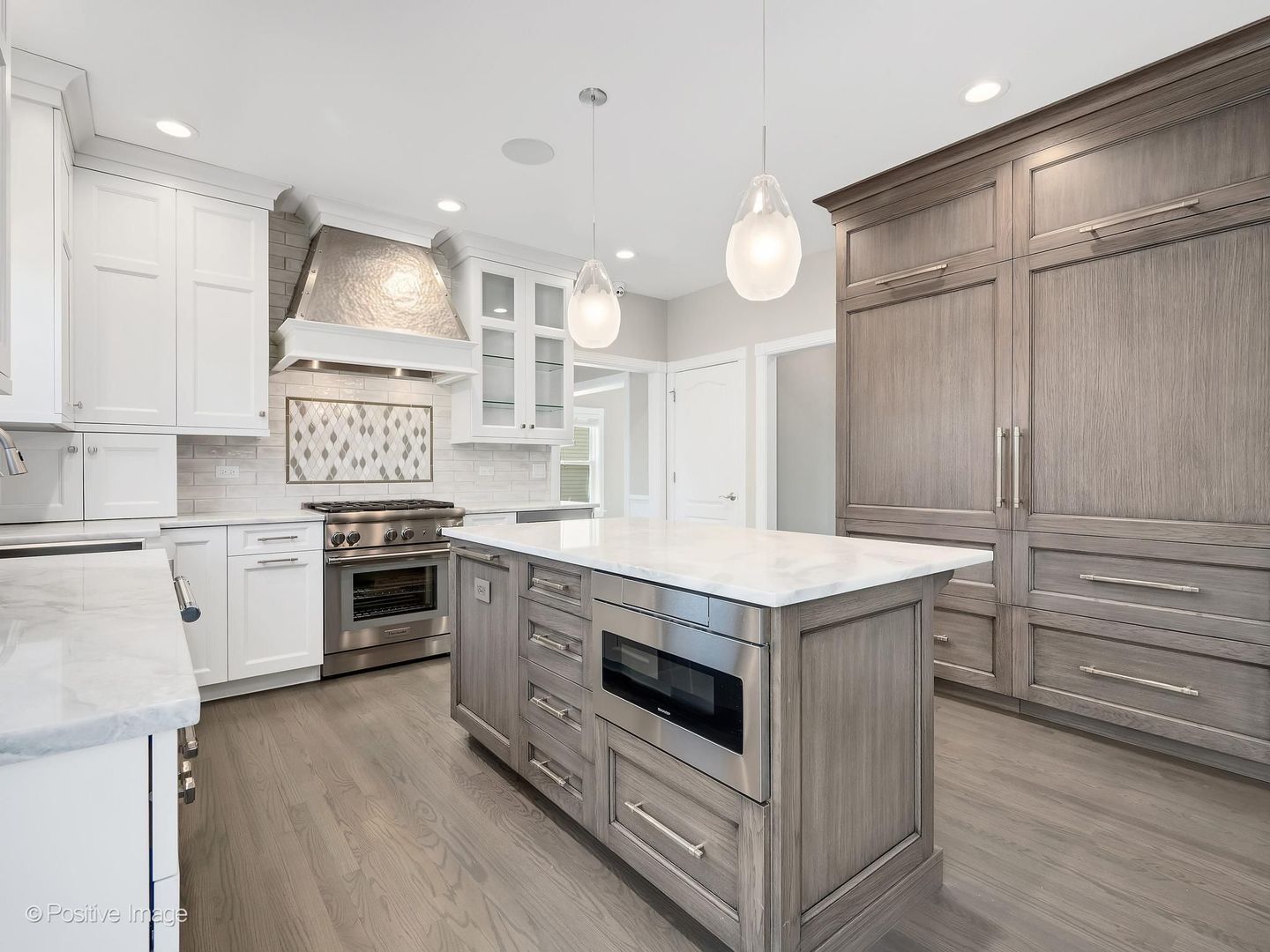 832 Bemis Road Glen Ellyn, IL 60137 - Photo 22 of 62 a kitchen with granite countertop a stove and a sink