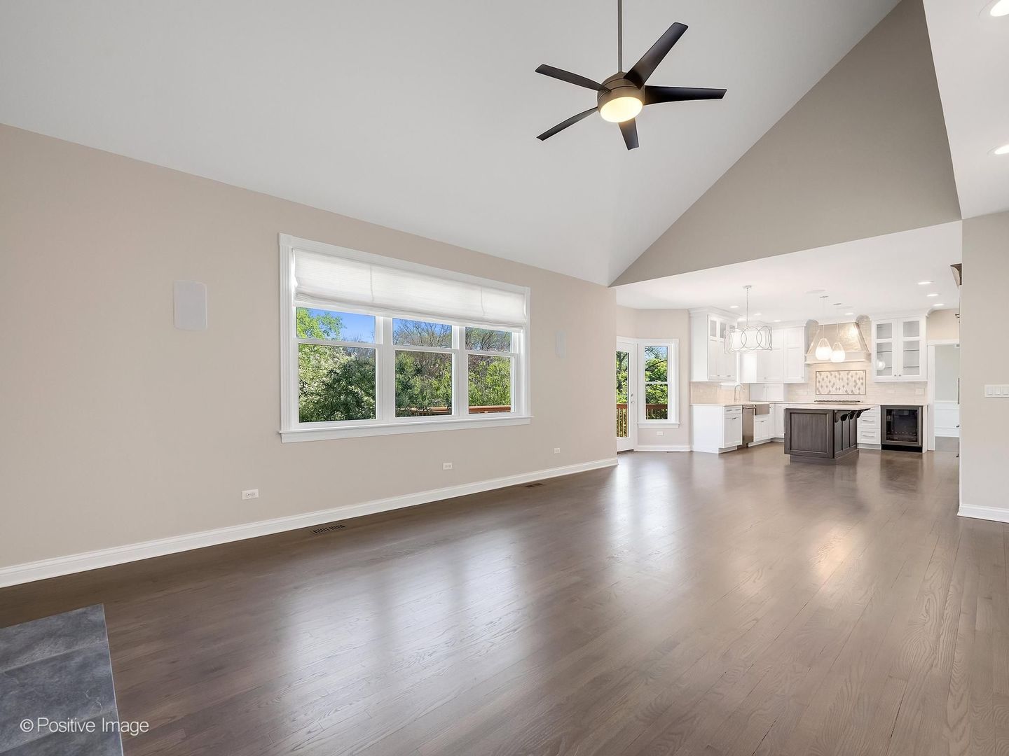 832 Bemis Road Glen Ellyn, IL 60137 - Photo 24 of 62 a view of an empty room with wooden floor and a window