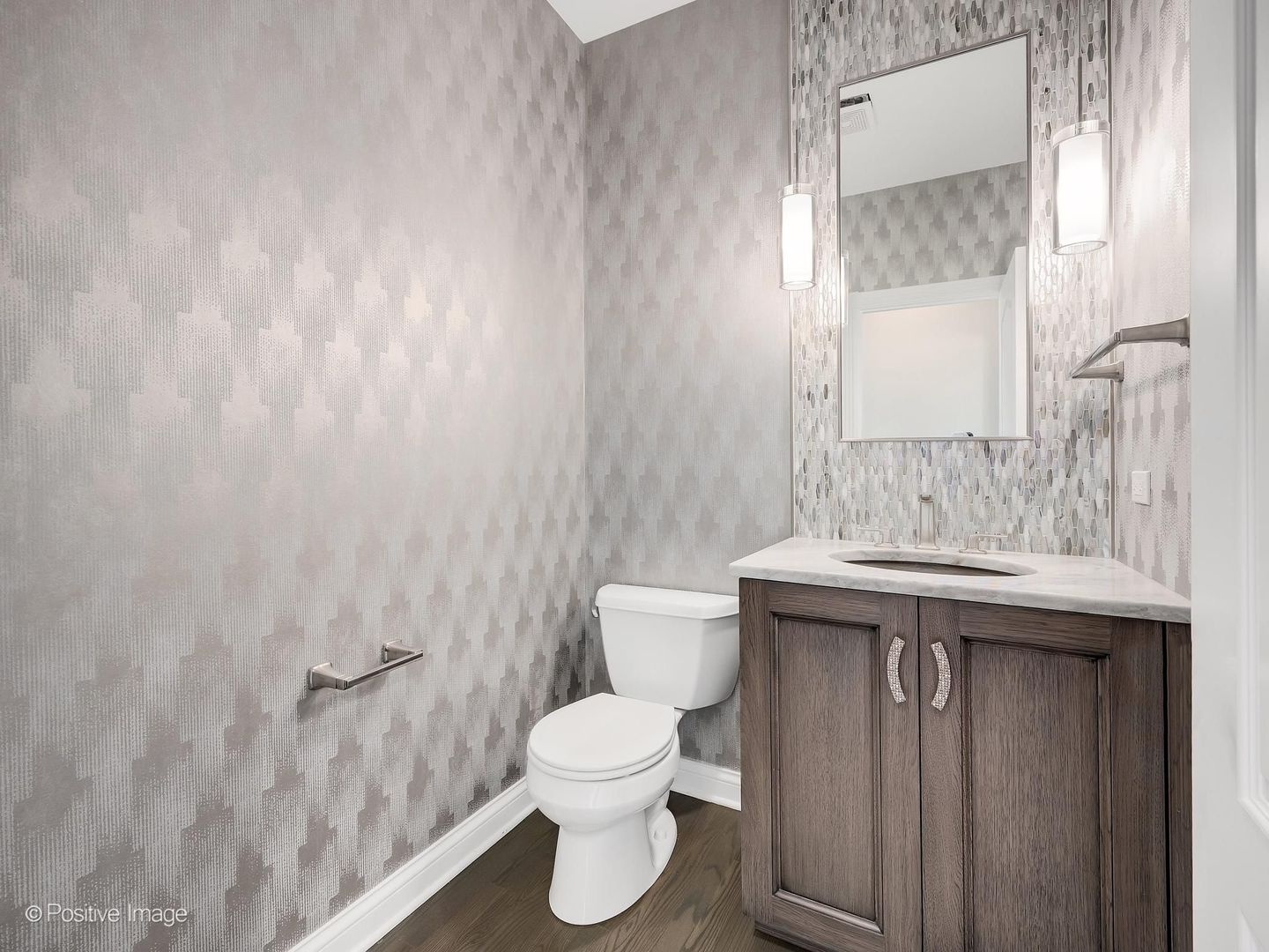 832 Bemis Road Glen Ellyn, IL 60137 - Photo 29 of 62 a bathroom with a granite countertop toilet a sink and a mirror