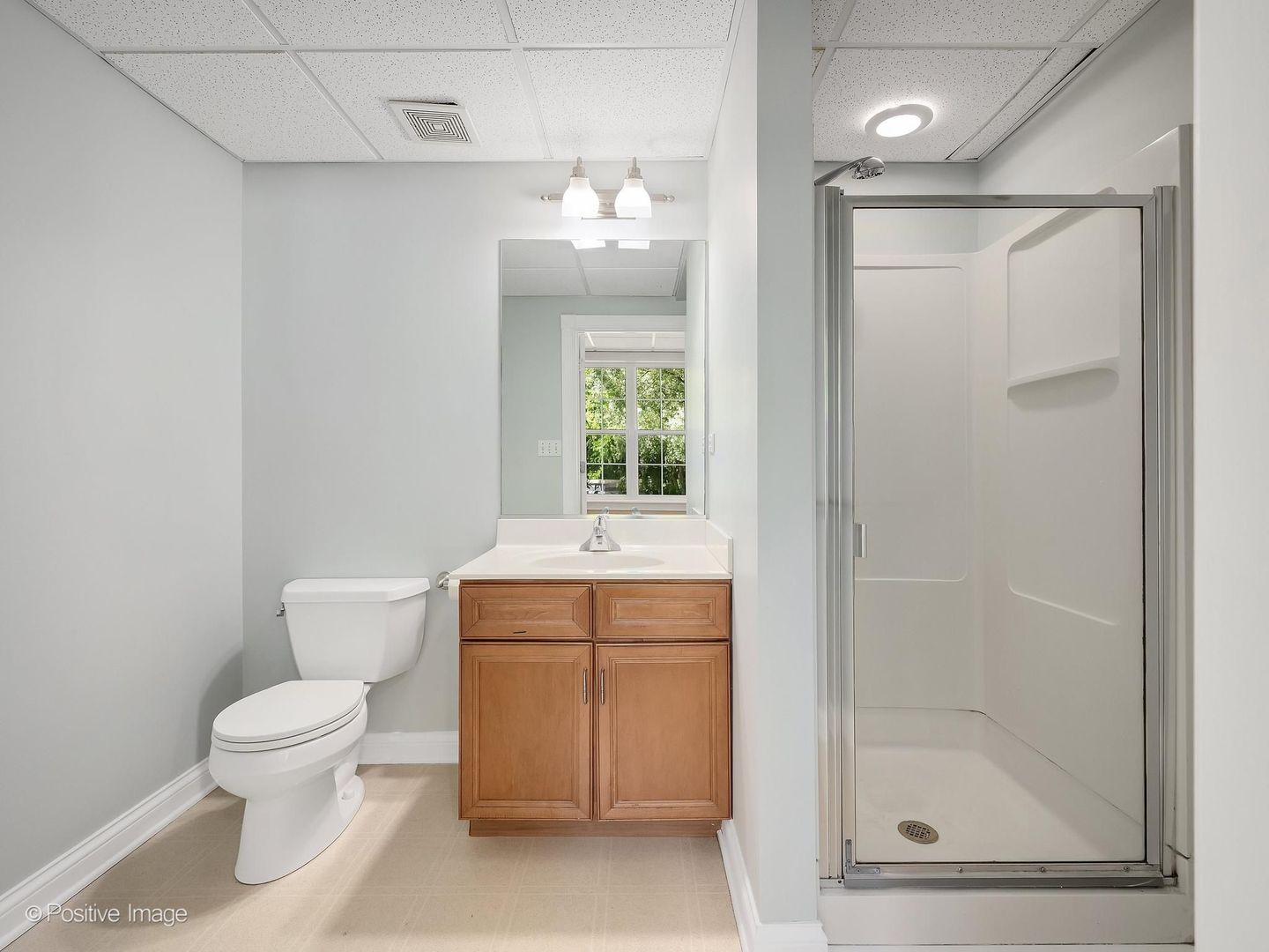 832 Bemis Road Glen Ellyn, IL 60137 - Photo 51 of 62 a bathroom with a toilet sink and mirror