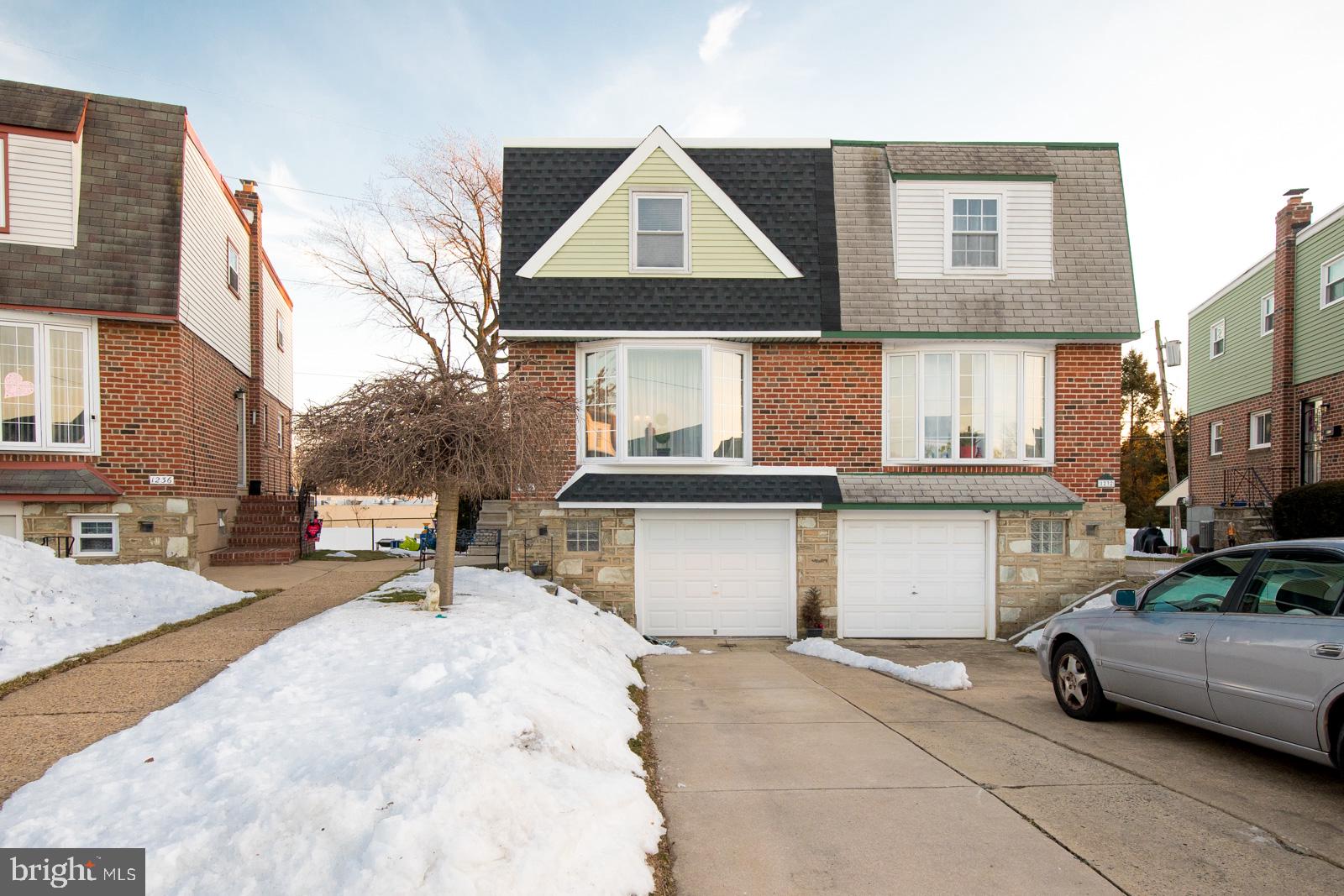 3 bedroom, 1.5 bathroom Twin with private driveway