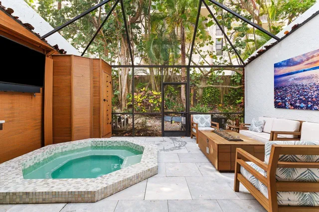 a view of a backyard with a tub