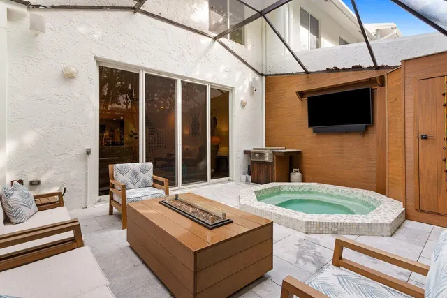 a house view with a sink and mirror