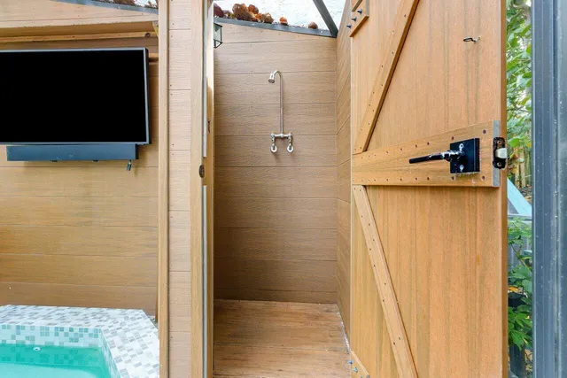 a outdoor living space with furniture and tree