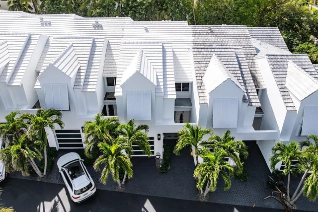 an aerial view of residential house with outdoor space and street view