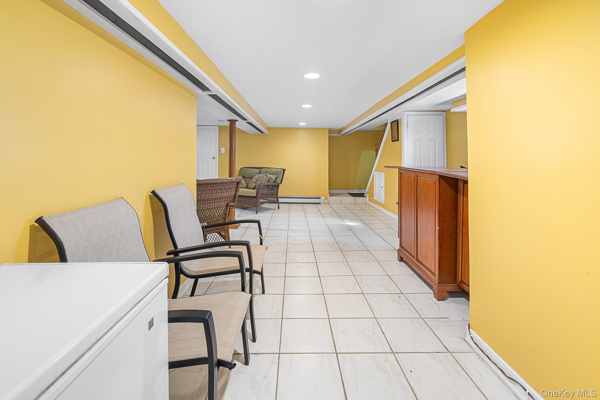 27-11 Deerfield Road Queens, NY 11691 - Photo 21 of 43 a view of a hallway with seating area