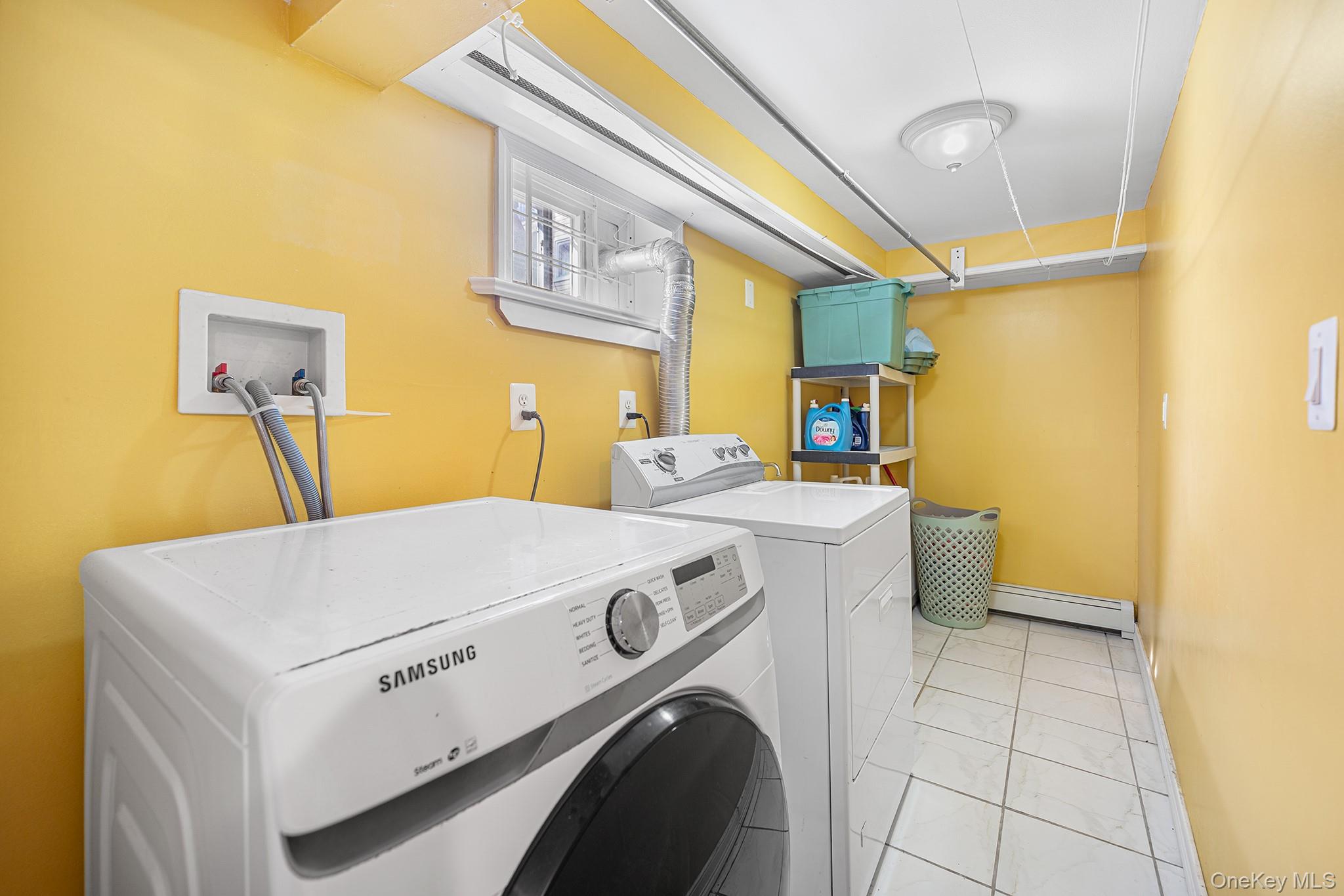 27-11 Deerfield Road Queens, NY 11691 - Photo 23 of 43 a utility room with dryer and washer