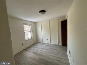 1081 Niagara Road Camden, NJ 08104 - Photo 6 of 10 an empty room with windows