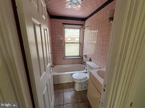 1081 Niagara Road Camden, NJ 08104 - Photo 7 of 10 a bathroom with a sink toilet and shower