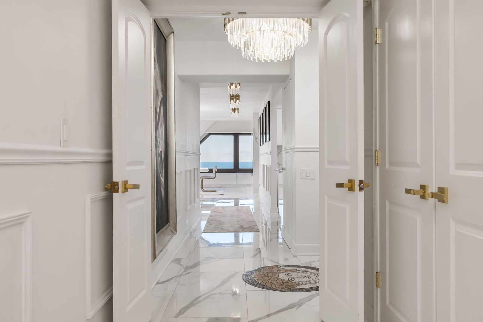 175 East Delaware Place, Unit 580102 Chicago, IL 60611 - Photo 20 of 33 a view of a hallway with furniture and wooden floor