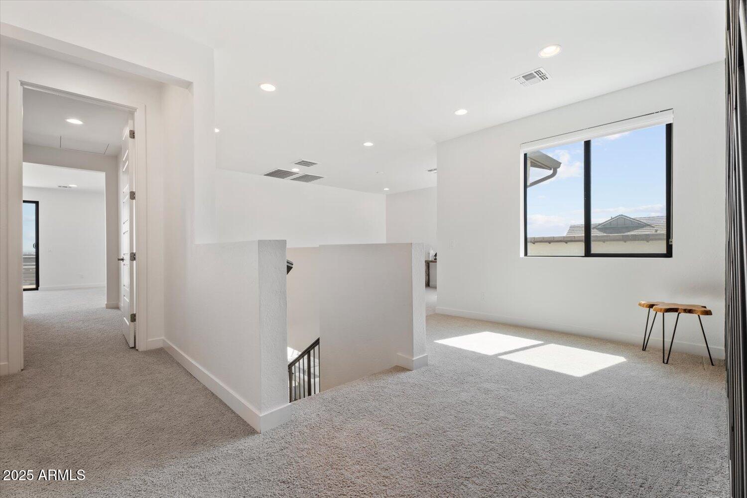 816 East Monte Way Phoenix, AZ 85042 - Photo 14 of 35 a view of an empty room with a window