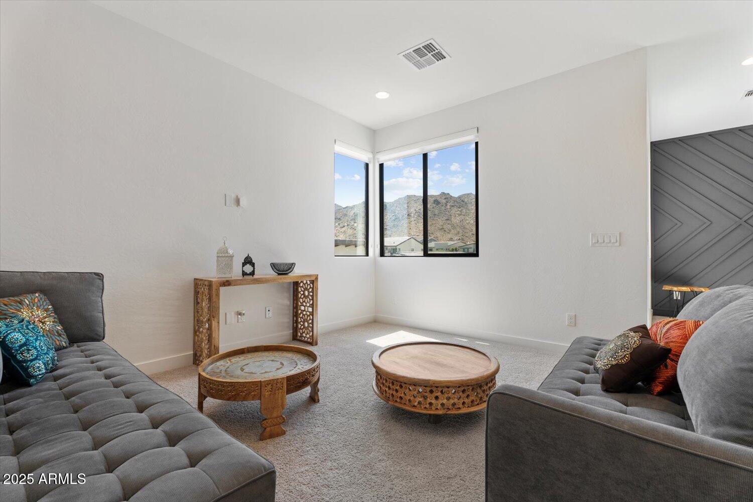 816 East Monte Way Phoenix, AZ 85042 - Photo 16 of 35 a living room with furniture and a window